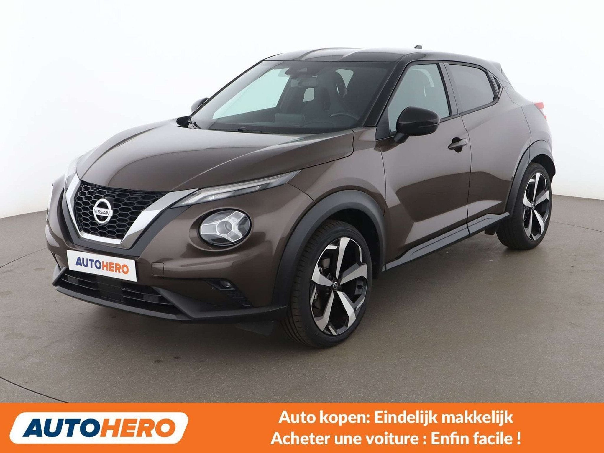 Nissan Juke 1.0 DIG-T Tekna (bj 2021, automaat), Gebruikt, Bruin, 5 zetels, 5 deurs