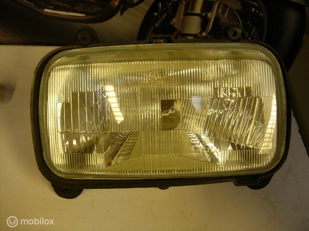 Koplamp origineel paso 759 906 907ie 907 ie, Motoren, Gebruikt, Ophalen of Verzenden