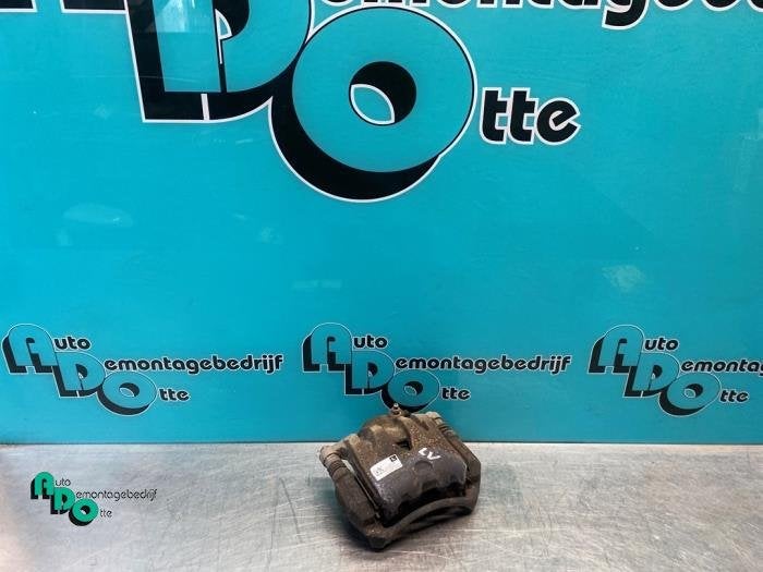 Etrier de frein (pince) avant gauche d'un Opel Karl (Karl 15, -, Opel, 3 mois de garantie, Utilisé