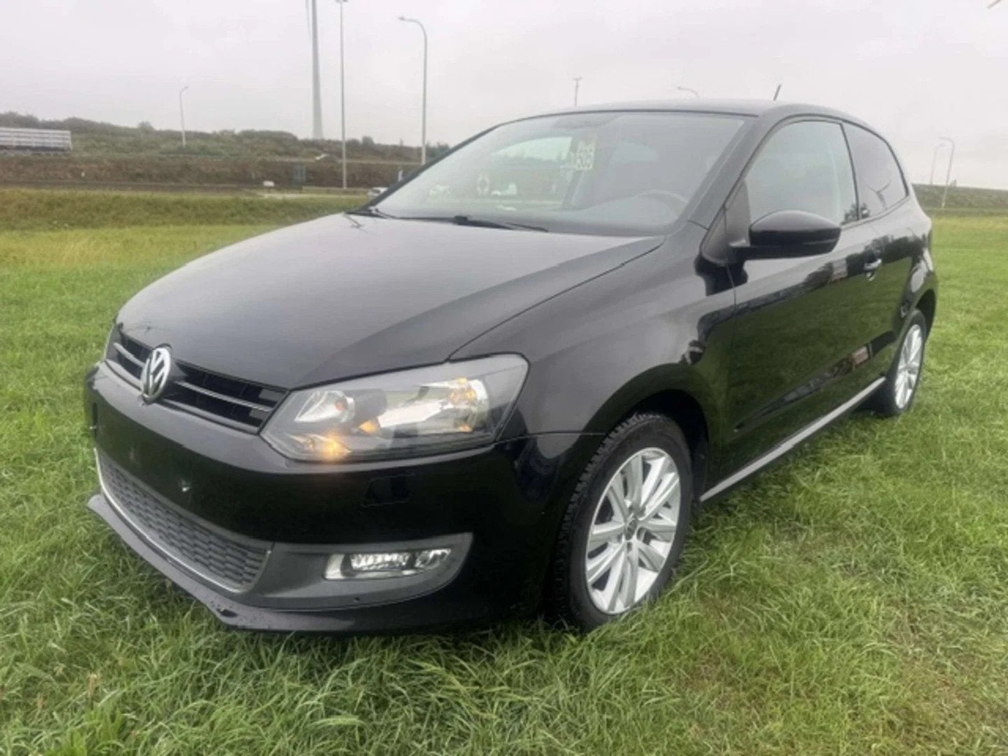 Volkswagen Polo Polo 1.2i Style / Garantie 12m. (bj 2012), Auto's, Euro 5, Stof, Gebruikt, Zwart