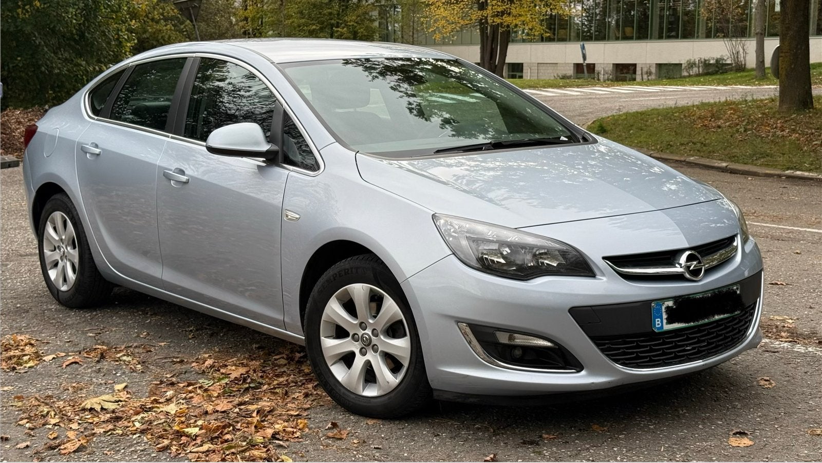 Opel Astra Sedan Automaat 1.4i Benzine 6/2014 Clim Pdc, Auto's, Stof, 4 cilinders, Blauw, Grijs