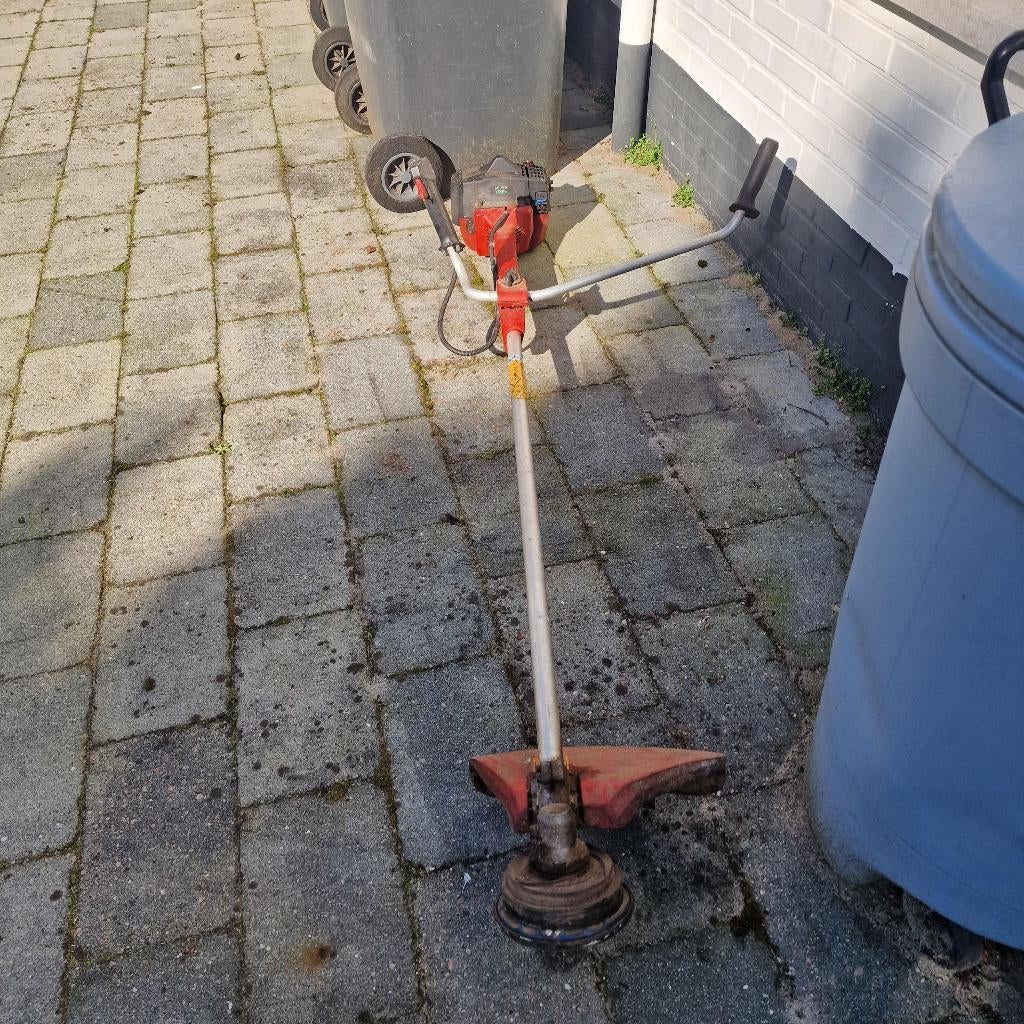 oudere gebruikte bosmaaier  Jonsered GR2036, Tuin en Terras, Bosmaaiers, Ophalen, Benzine, Gebruikt, Jonsered