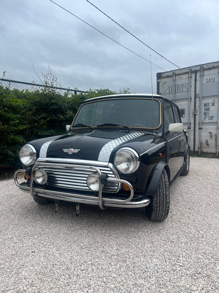 Mini Cooper Classic 1.3MPI topstaat, Auto's, Oldtimers, Particulier, Radio, Mini, Benzine, Coupé, 2 deurs, Handgeschakeld, Zwart