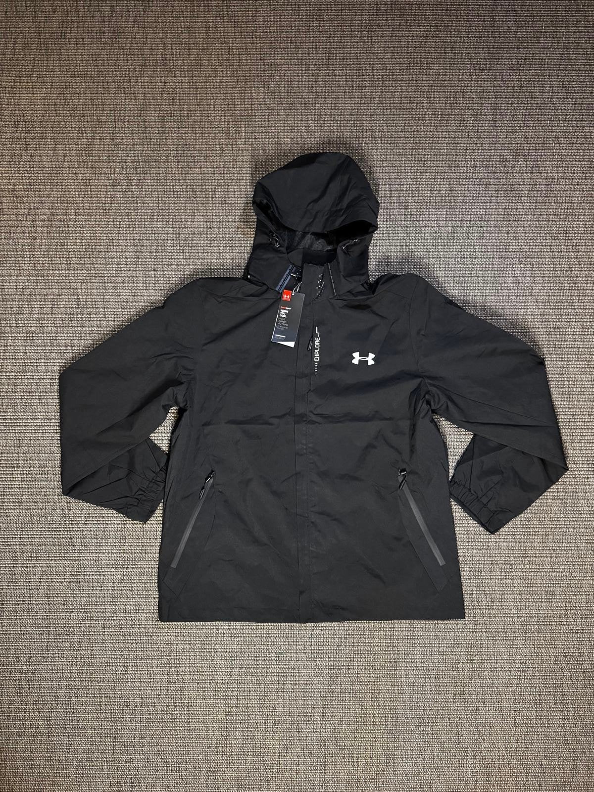 Veste de pluie Under Armour nouvelle !, Enlèvement ou Envoi, Neuf, Taille 52/54 (L), Noir