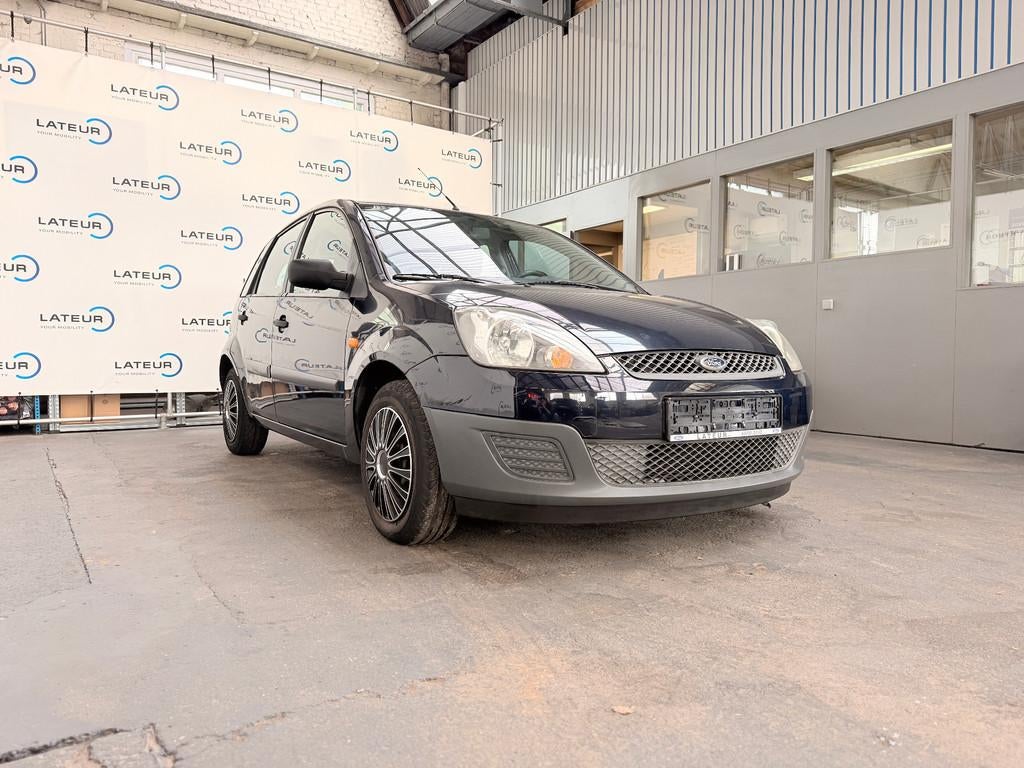 Ford Fiesta 5 deurs (bj 2006), Auto's, Ford, 144 g/km, 1299 cc, Stof, Gebruikt