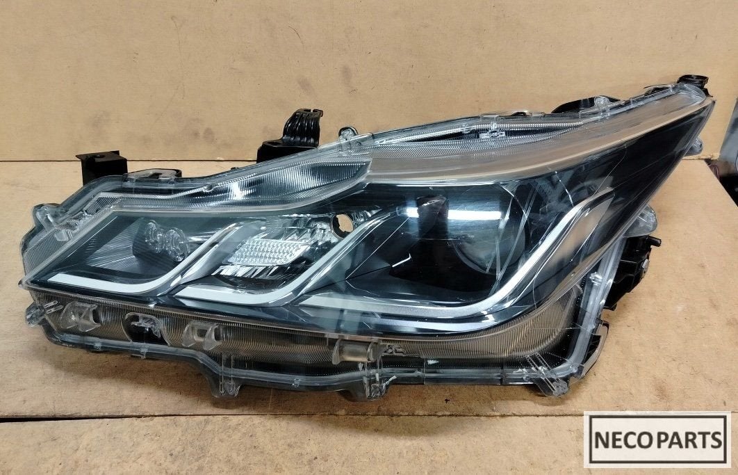 TOYOTA COROLLA E21 SEDAN LED KOPLAMP 81150-02T31 ORIGINEEL, Gebruikt, -, -, Ophalen of Verzenden