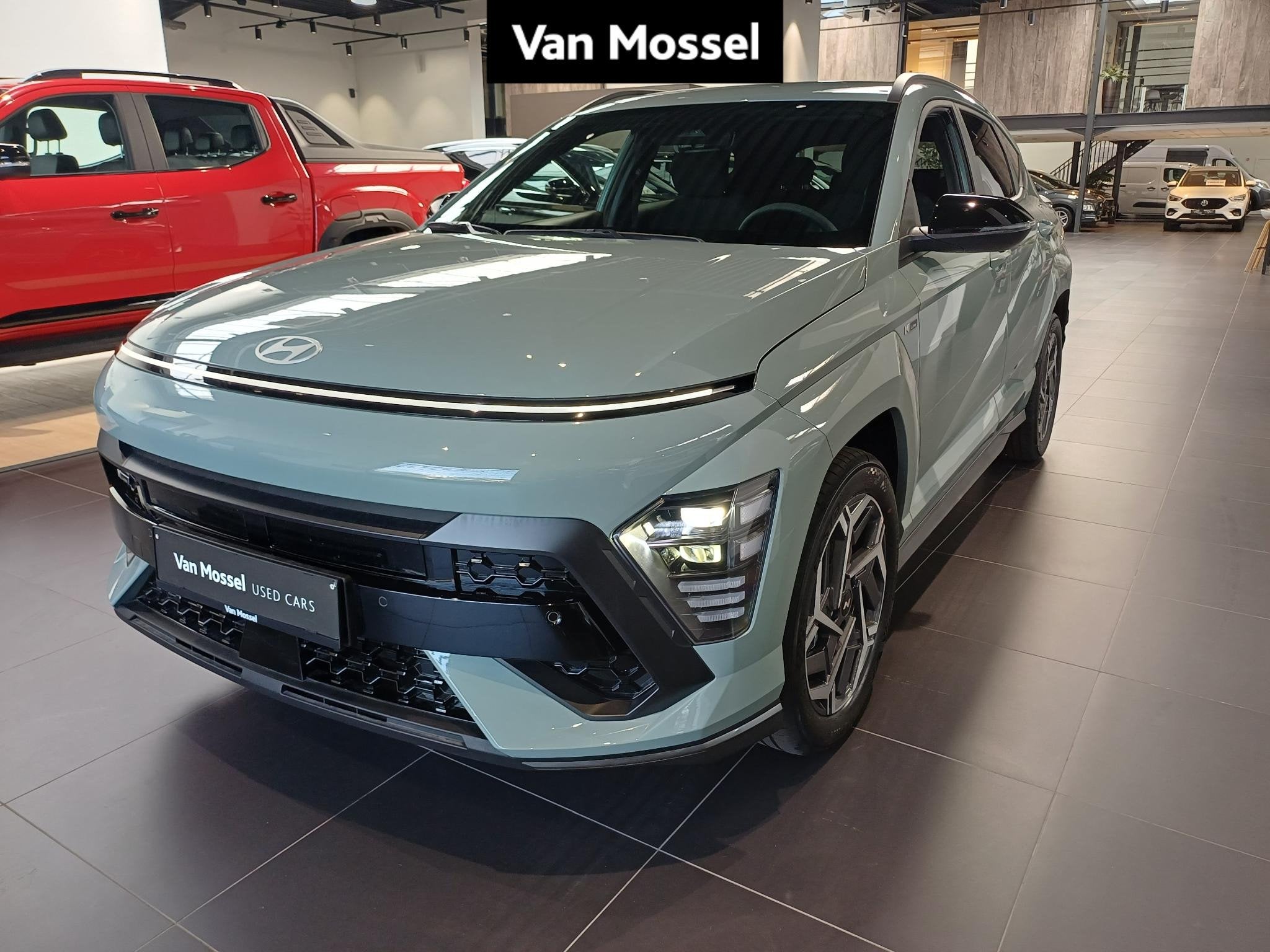 Hyundai Kona 1.6 T-GDI Feel N Line HEV 7-DCT, Auto's, Stof, Gebruikt, 4 cilinders, Lane Keeping Assist