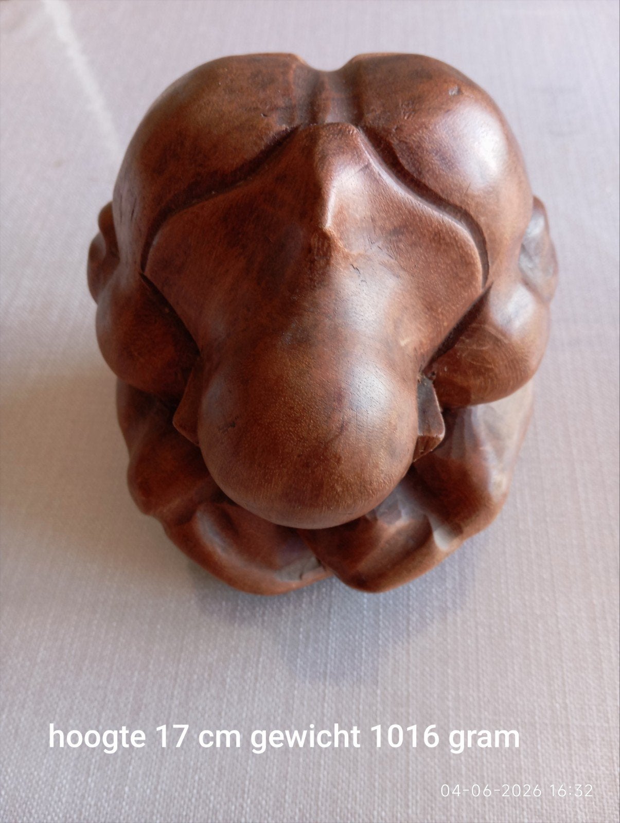 Boeddha beeld hout huilend man, Ophalen