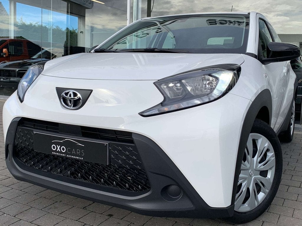 Toyota Aygo X 1.0i ESSENCE / AIRCO / CAMERA / CARPLAY / CRUI, Voorwielaandrijving, 4 zetels, Stof, Gebruikt