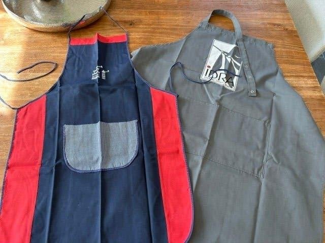 2 tabliers, Enlèvement ou Envoi, Lavable, Comme neuf, Multicolore