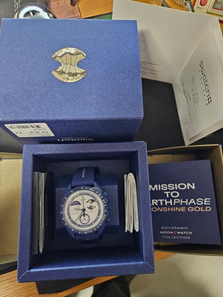 Swatch Moonswatch MISSION TO EARTHPHASE - MOONSHINE GOLD, Bijoux, Sacs & Beauté, Montres | Hommes, Neuf, Swatch, Enlèvement