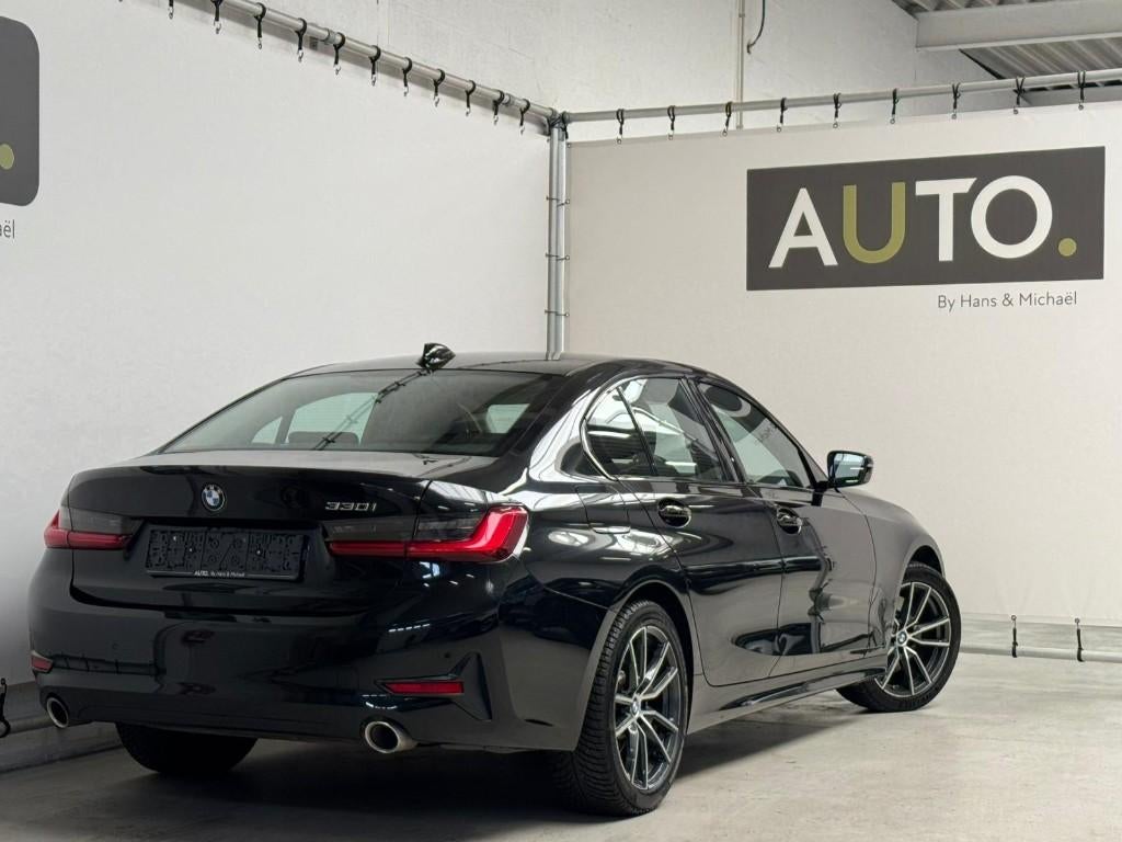 BMW 330iA Sportline *STUURVERW*SPORTZETLS*ACC*, Auto's, BMW, Automaat, Achterwielaandrijving, 4 cilinders, Leder en Stof