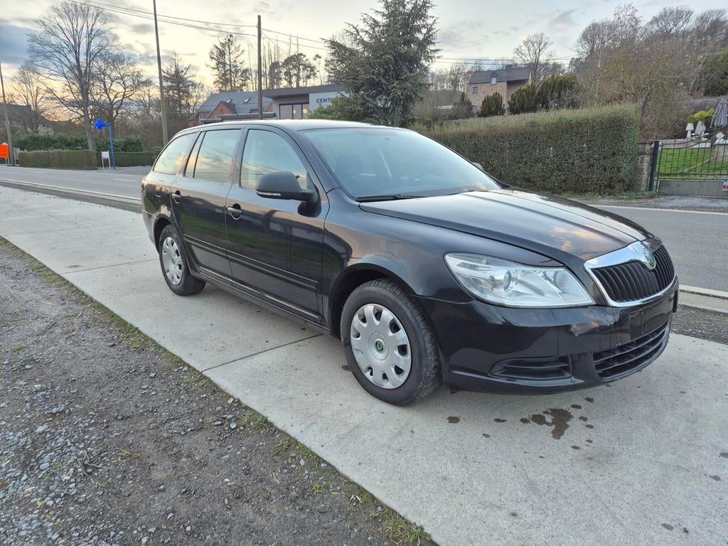 Skoda Octavia break 1.6Tdi " Très Propre" Airco, Auto's, Euro 5, Zwart, 1600 cc, Zwart