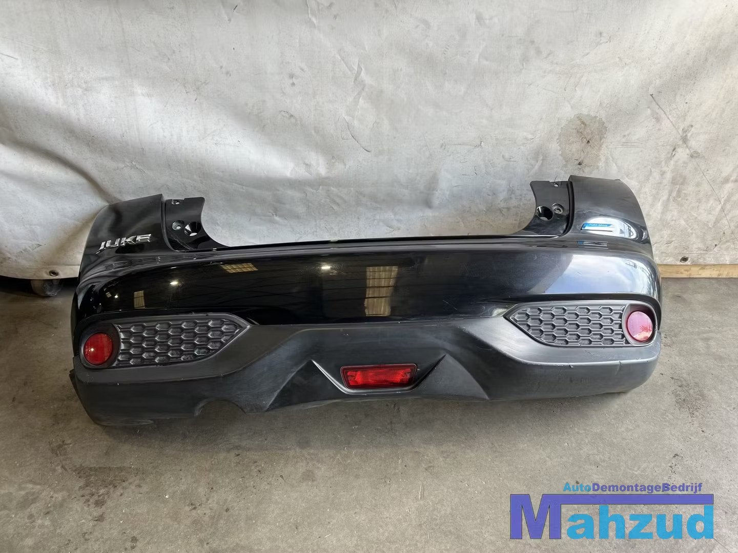 NISSAN JUKE F15 zwart sport achterbumper 2010-2019, Takashima 1-chome 1-1
220-8686  Yokohama, Achter, Bumper, NISSAN_SR@mail.nissan.co.jp
