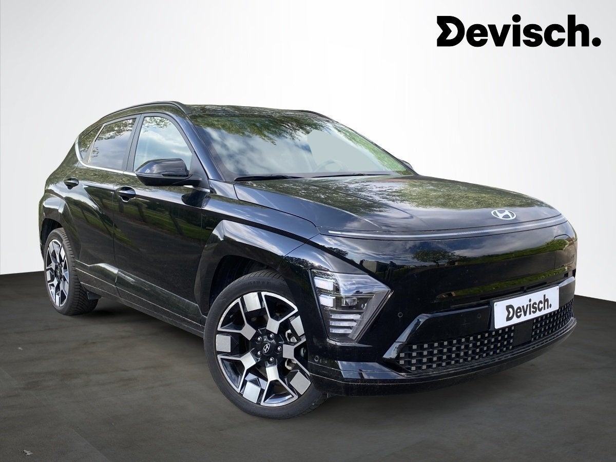 Hyundai KONA EV SHINE 65 kwh (bj 2024, automaat), Auto's, Gebruikt, Zwart, Zwart, Leder