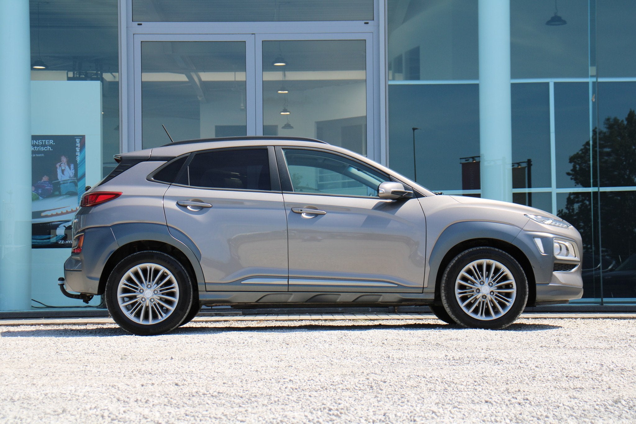 Hyundai KONA 1.0T Launch Edition *CAM*TREKHAAK*CLIMATEC*, Auto's, Hyundai, Voorwielaandrijving, Stof, Gebruikt, Zwart