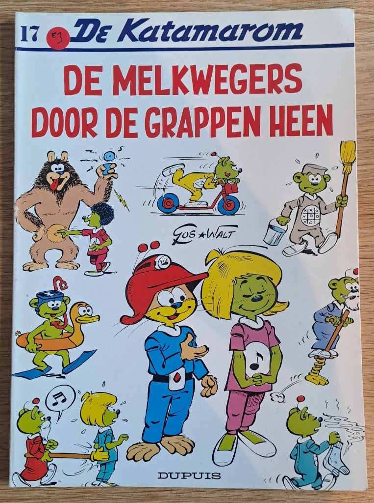 17 - De Katamarom - De Melkwegers door de grappen heen, Walt & Gos, Enlèvement ou Envoi, Une BD, Utilisé