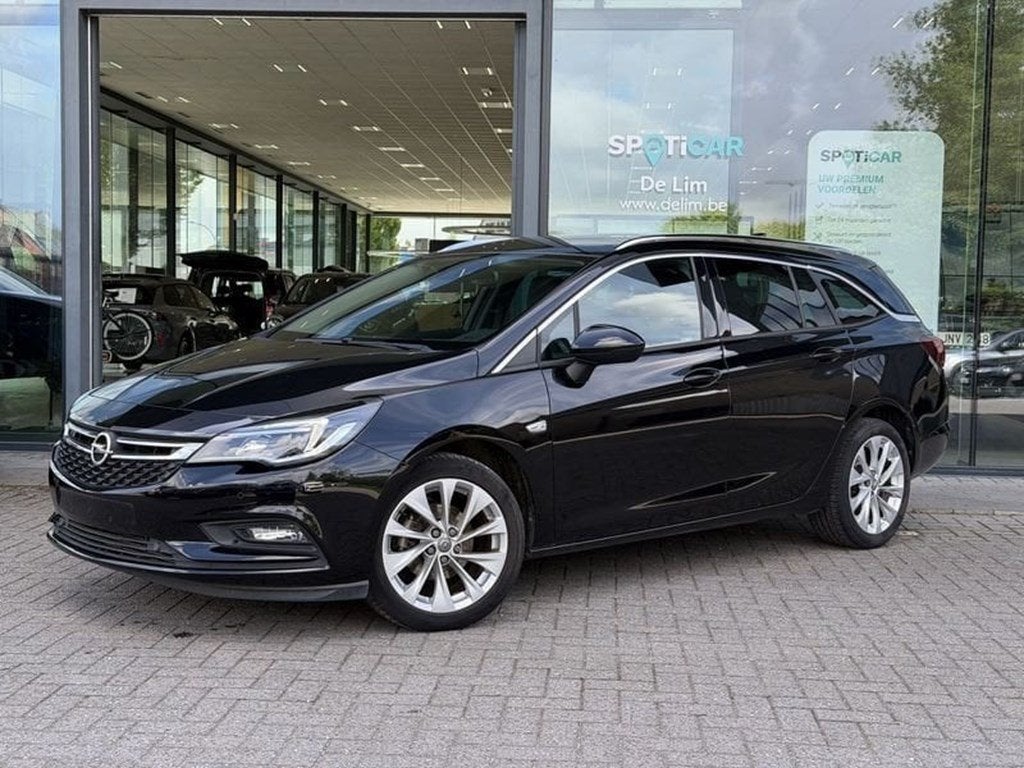 Opel Astra Sports Tourer Innovation 1.4T 125pk *Navi*CarPla, Auto's, Emergency brake assist, Zwart, Bedrijf, 5 deurs