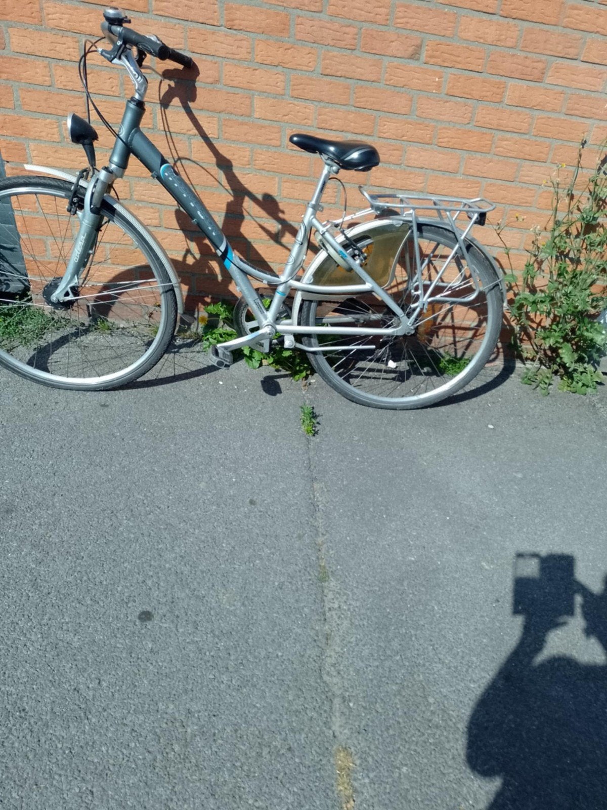 Damesfiets in goede staat, Ophalen