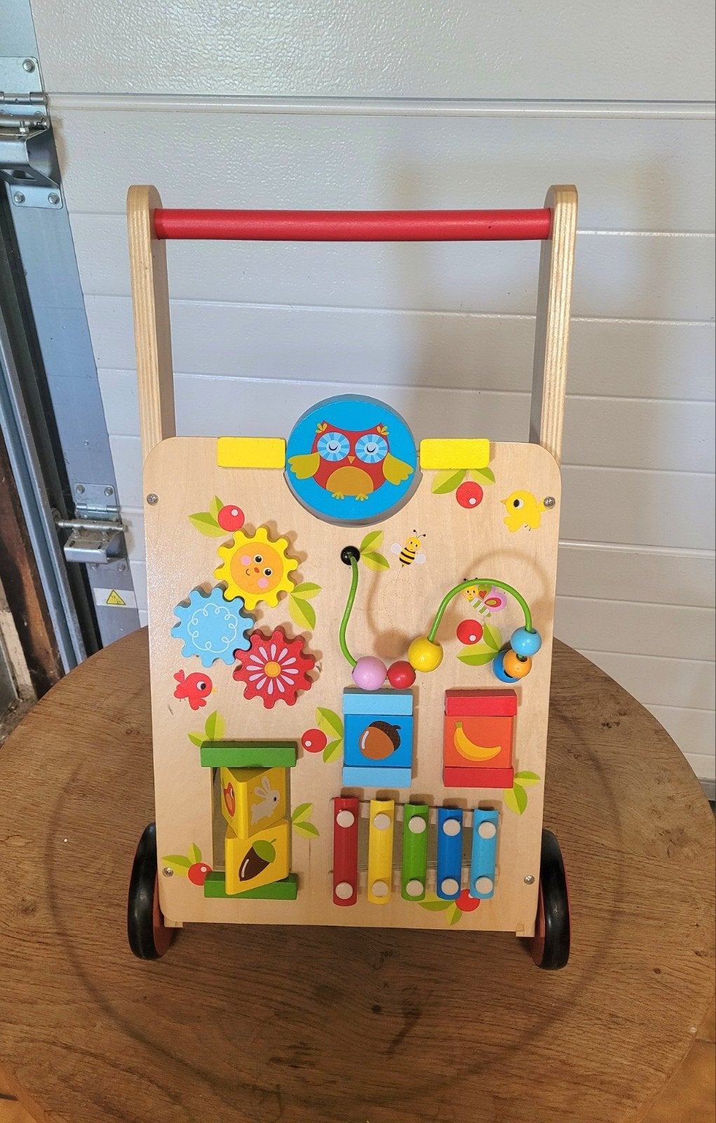 Educatieve houten rollator, Ophalen