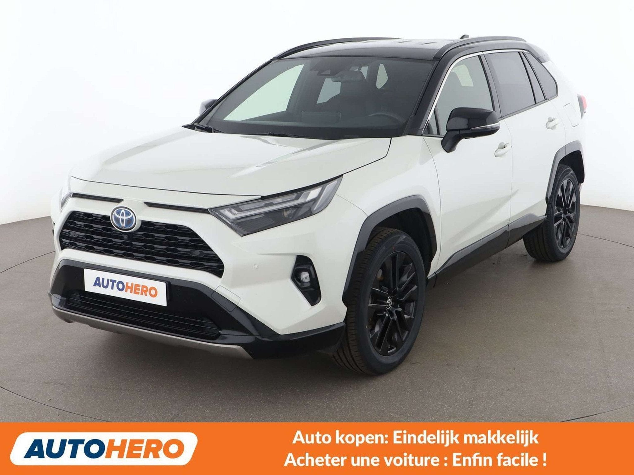 Toyota RAV4 2.5 Hybrid 4x2 Style Selection (bj 2022), Auto's, Gebruikt, 2487 cc, Wit, Leder
