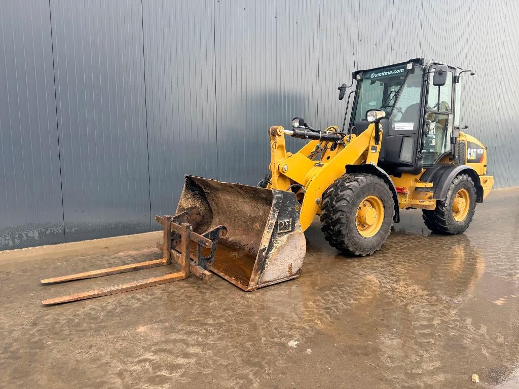 Caterpillar 907M Wiellader 2016 Incl. Palletvork en Laadbak, Enlèvement, Chargeuse sur pneus ou Chouleur