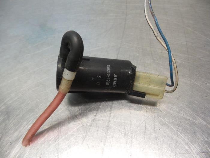 Pompe lave-glace avant d'un Daihatsu Sirion (Sirion 98-), Daihatsu, -, 3 mois de garantie, Utilisé