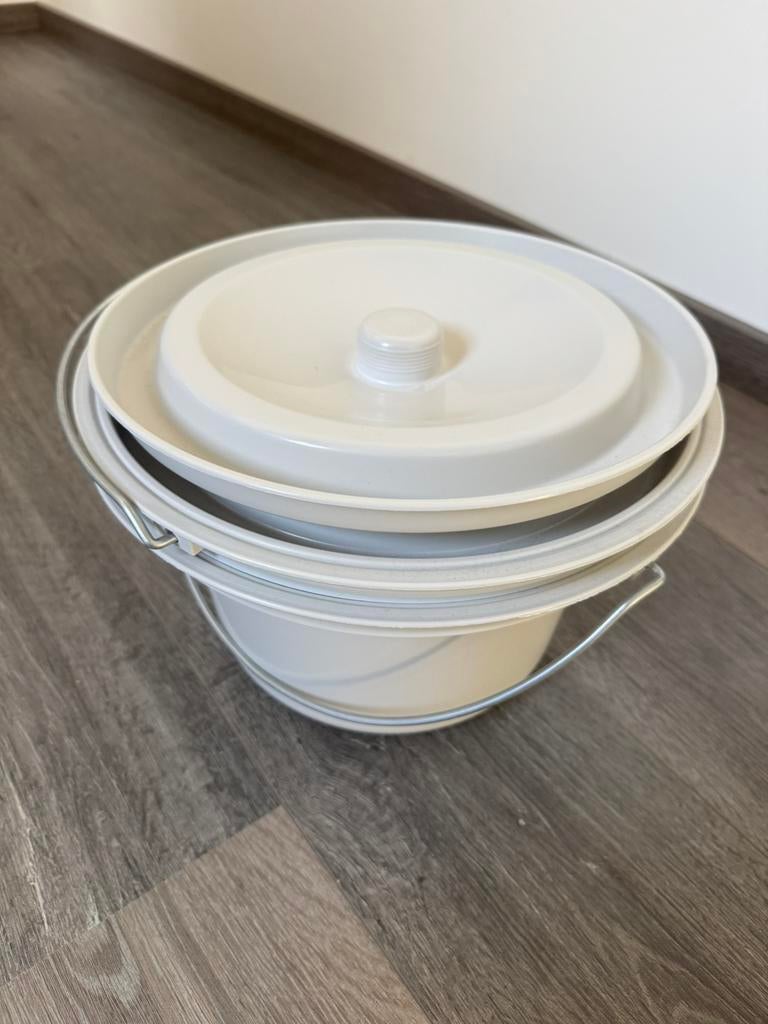 Emmer voor toiletstoel, Enlèvement