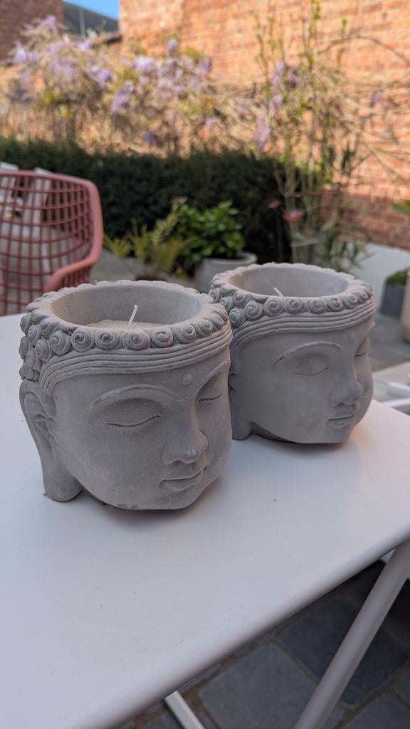 Twee buddha hoofden met kaars, Ophalen
