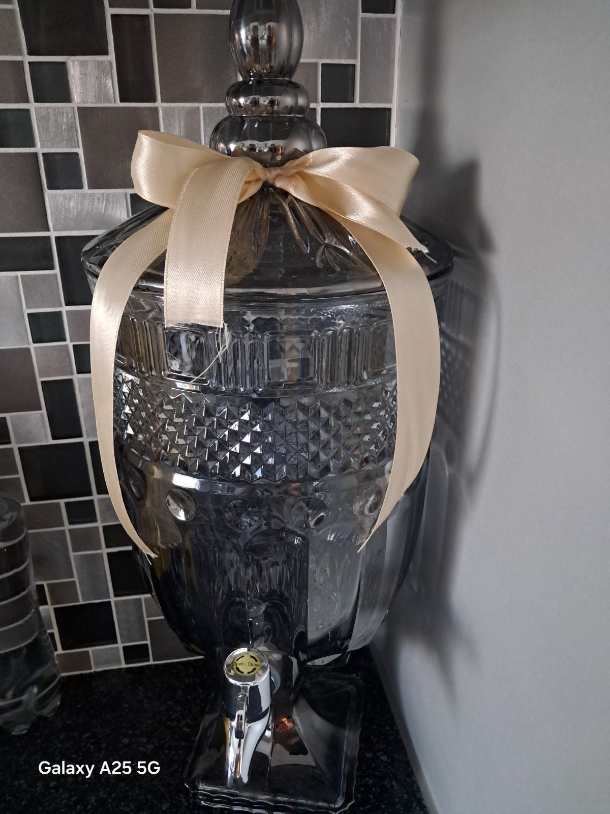 Distributeur de boisson avec robinet, Enlèvement
