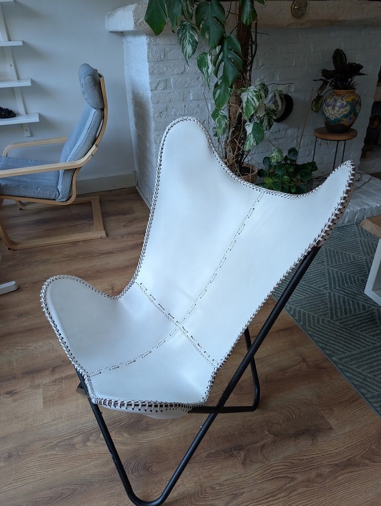 vlinderstoel (wit leder), Ophalen, Leer