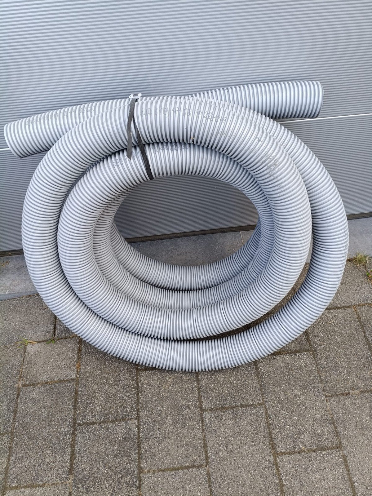 drain à tuyau enroulé, Enlèvement