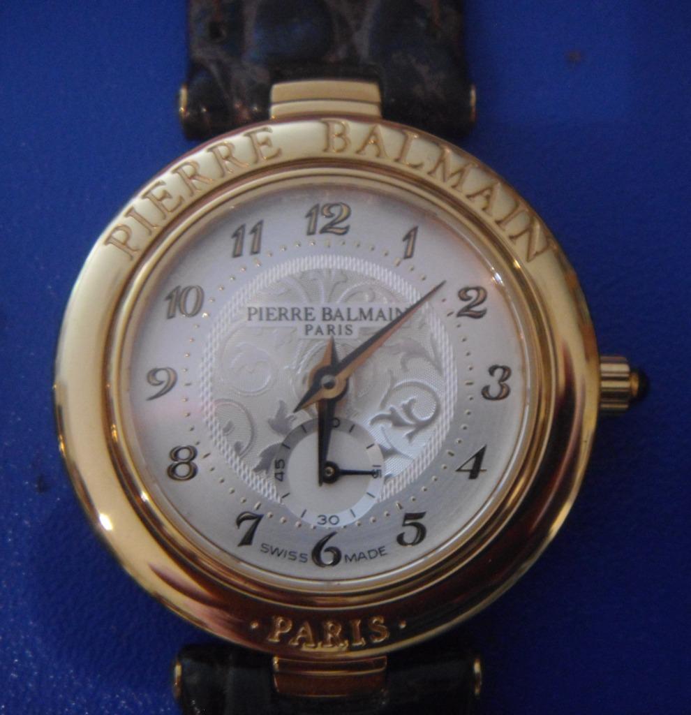 Montre dame Balmain, cadran blanc, plaqué or, arabesques, Collections, Enlèvement, Neuf