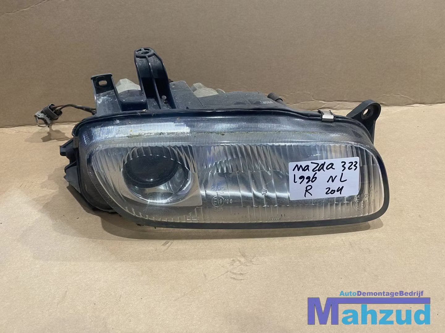 MAZDA 323 F V koplamp rechts links 1994-1998, Gebruikt, Shinchi, Fuchu-Cho 3-1
730-8670  Hiroshima, Mazda Motor Corporation, Info@mazda.co.jp