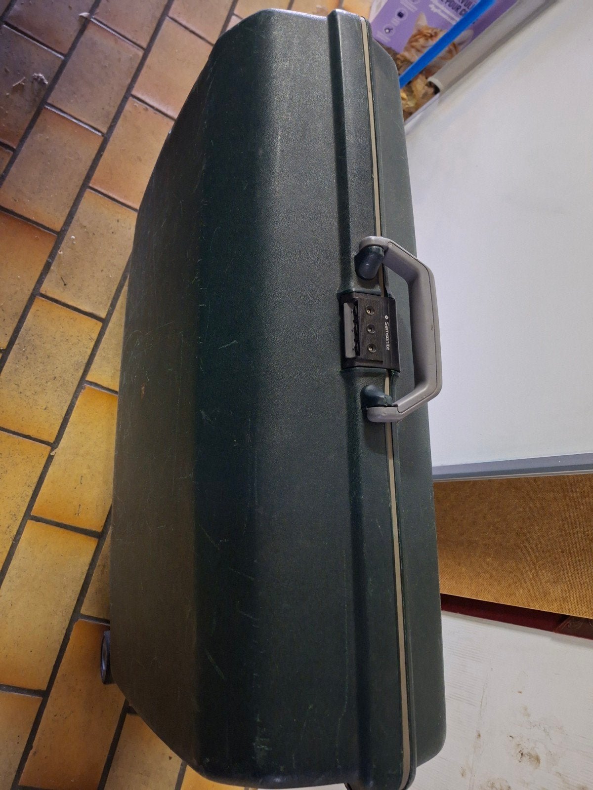 Grote reiskoffer samsonite, Ophalen