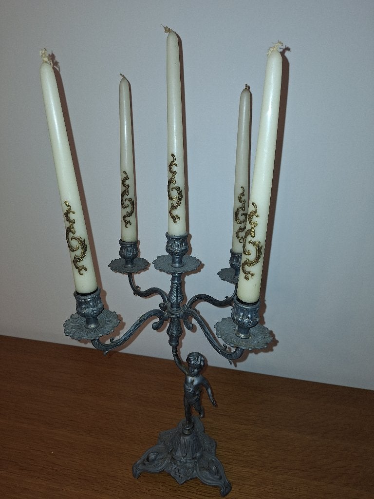 Vintage kandelaar met puttofiguur, Ophalen
