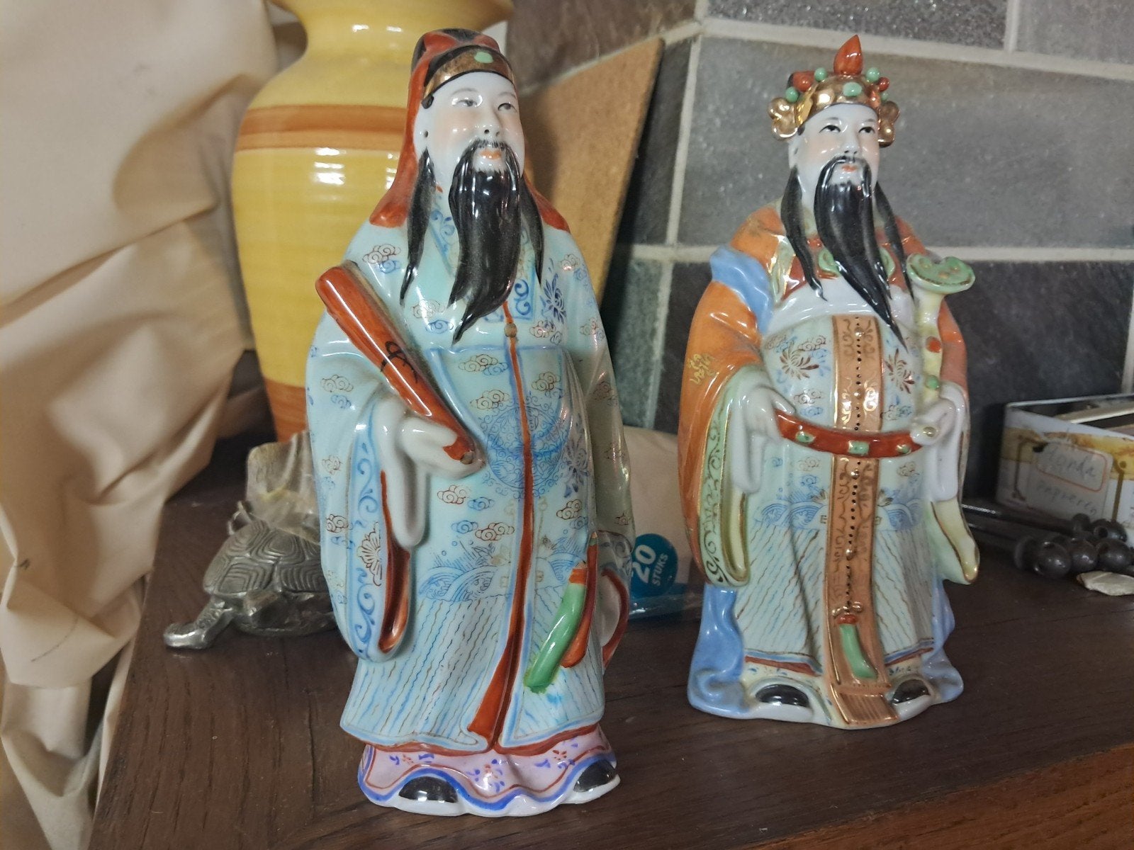 2 beeldjes krijgers, Ophalen