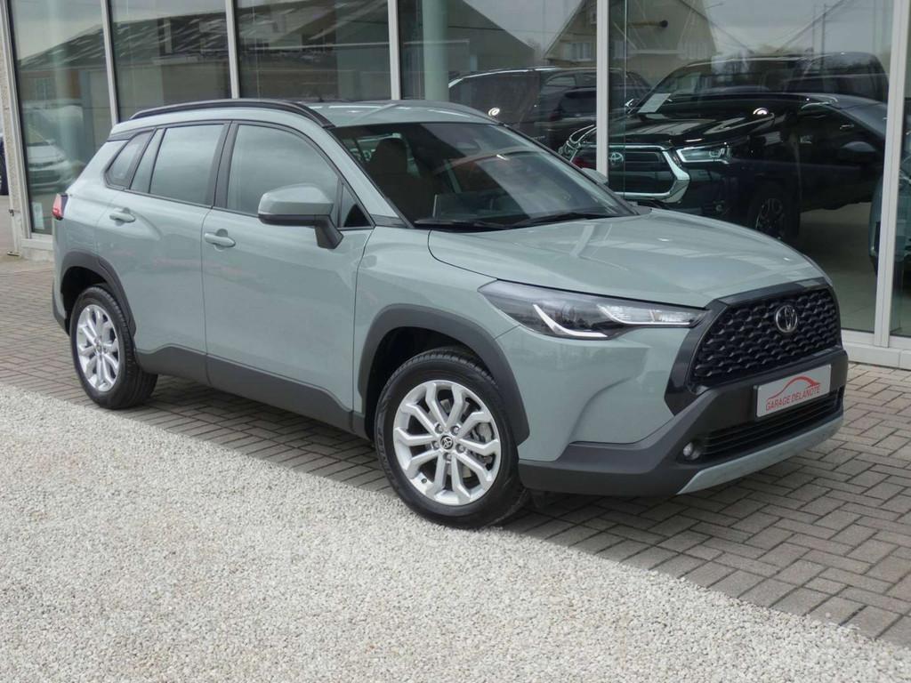 Toyota Corolla Cross 1.8 Hybrid 140PK +Dodehoek +Parkeersens, Auto's, Stof, Gebruikt, Zwart, 4 cilinders