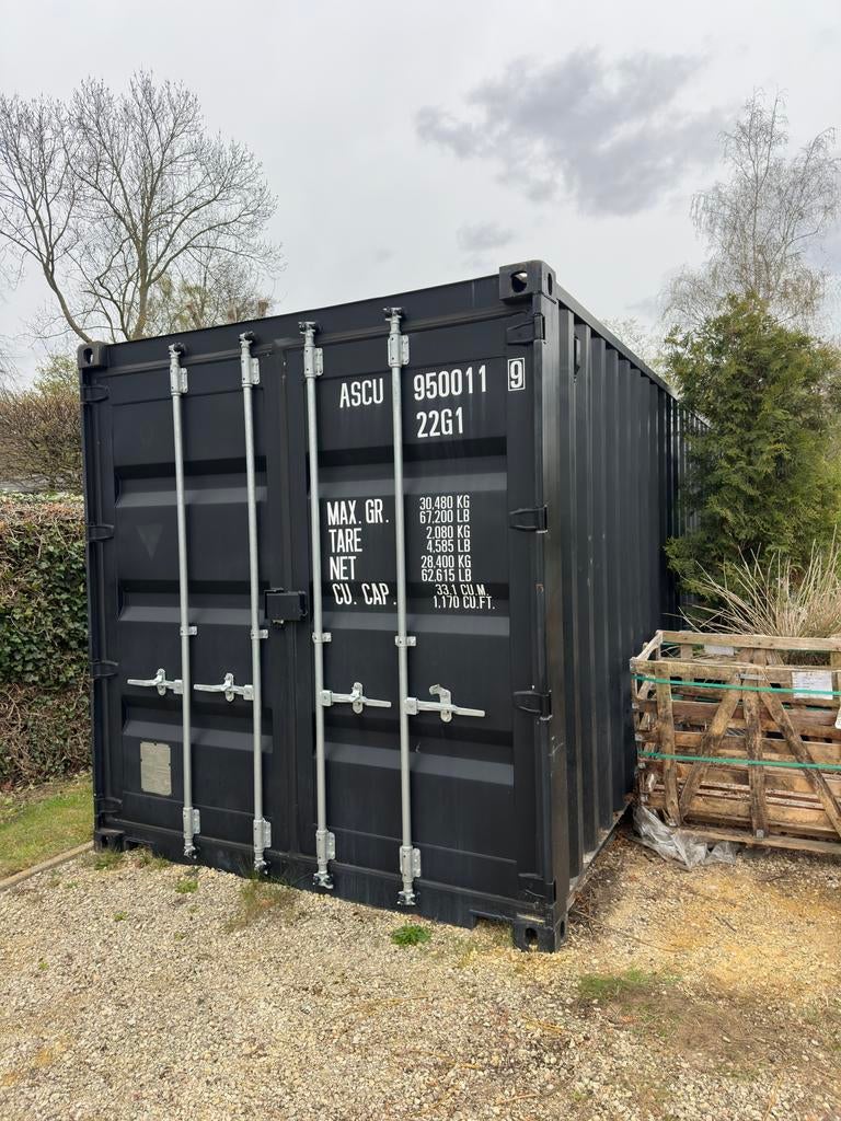 Zwarte zee container in nieuwstaat., Ophalen
