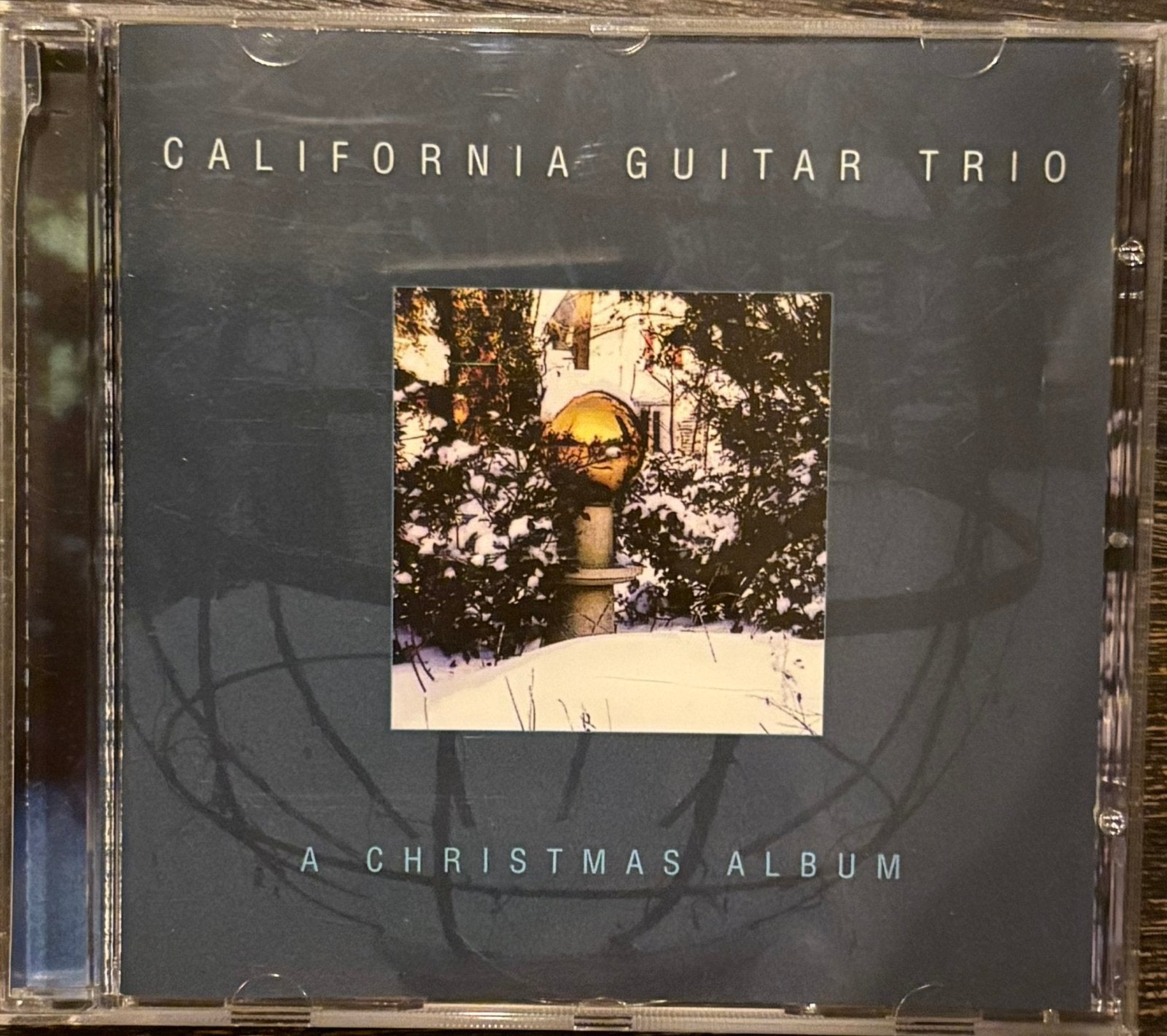 CALIFORNIA GUITAR TRIO - A Christmas Album, CD & DVD, CD | Rock, Enlèvement ou Envoi, Comme neuf, Rock classique, Album