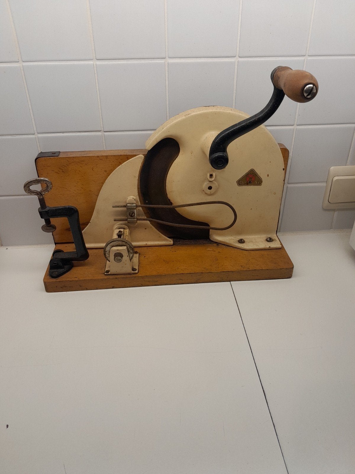 antiek manueel snijmachine, Ophalen