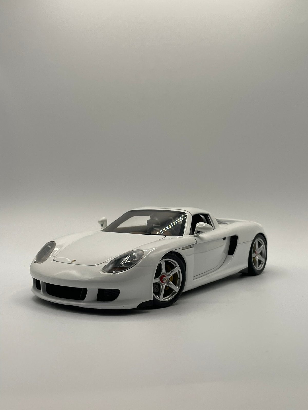 Porsche Carrera GT Minichamps 1/18, Ophalen, Zo goed als nieuw, MiniChamps