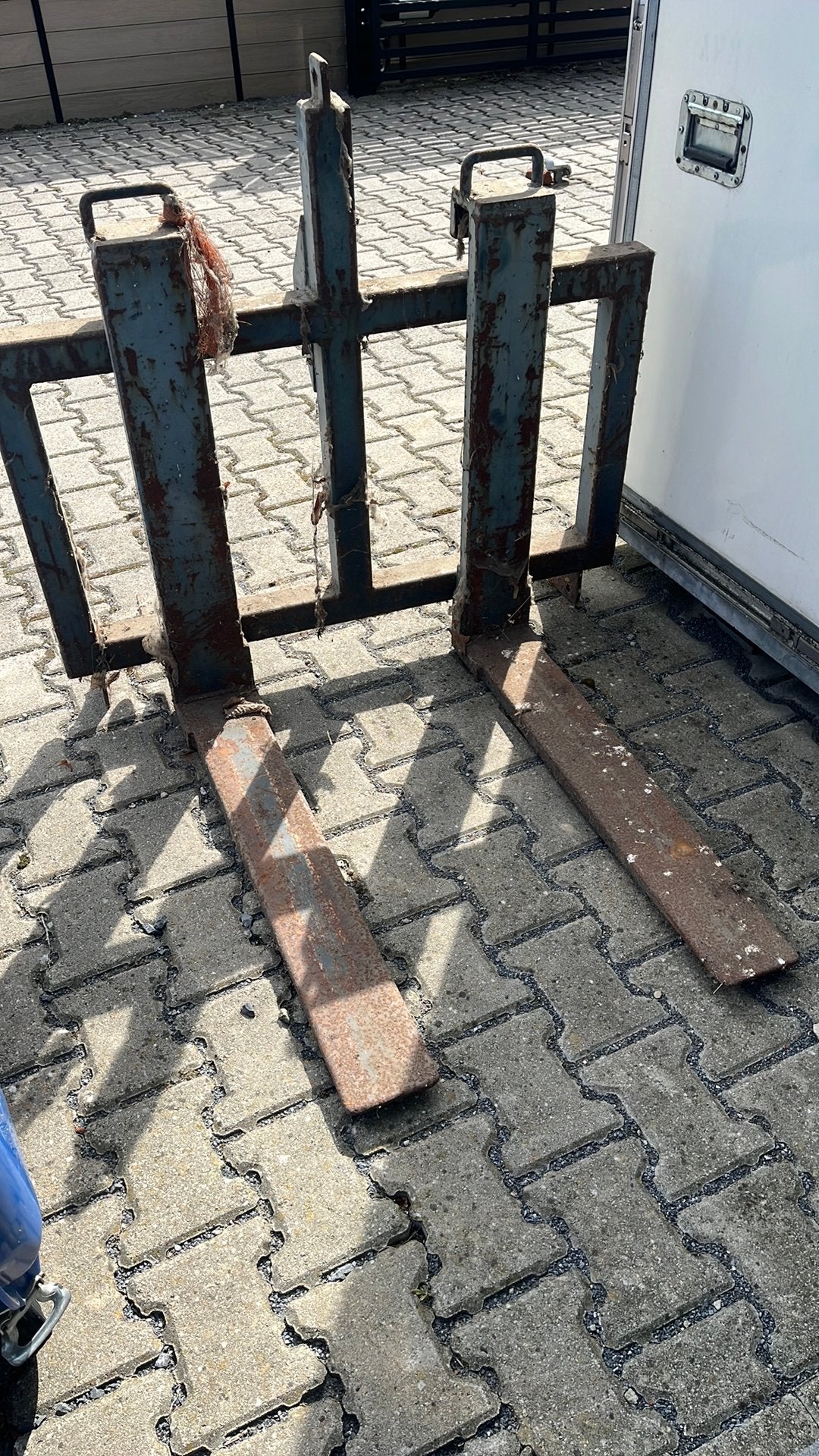 Palletvorken voor (mini-) tractor, Ophalen