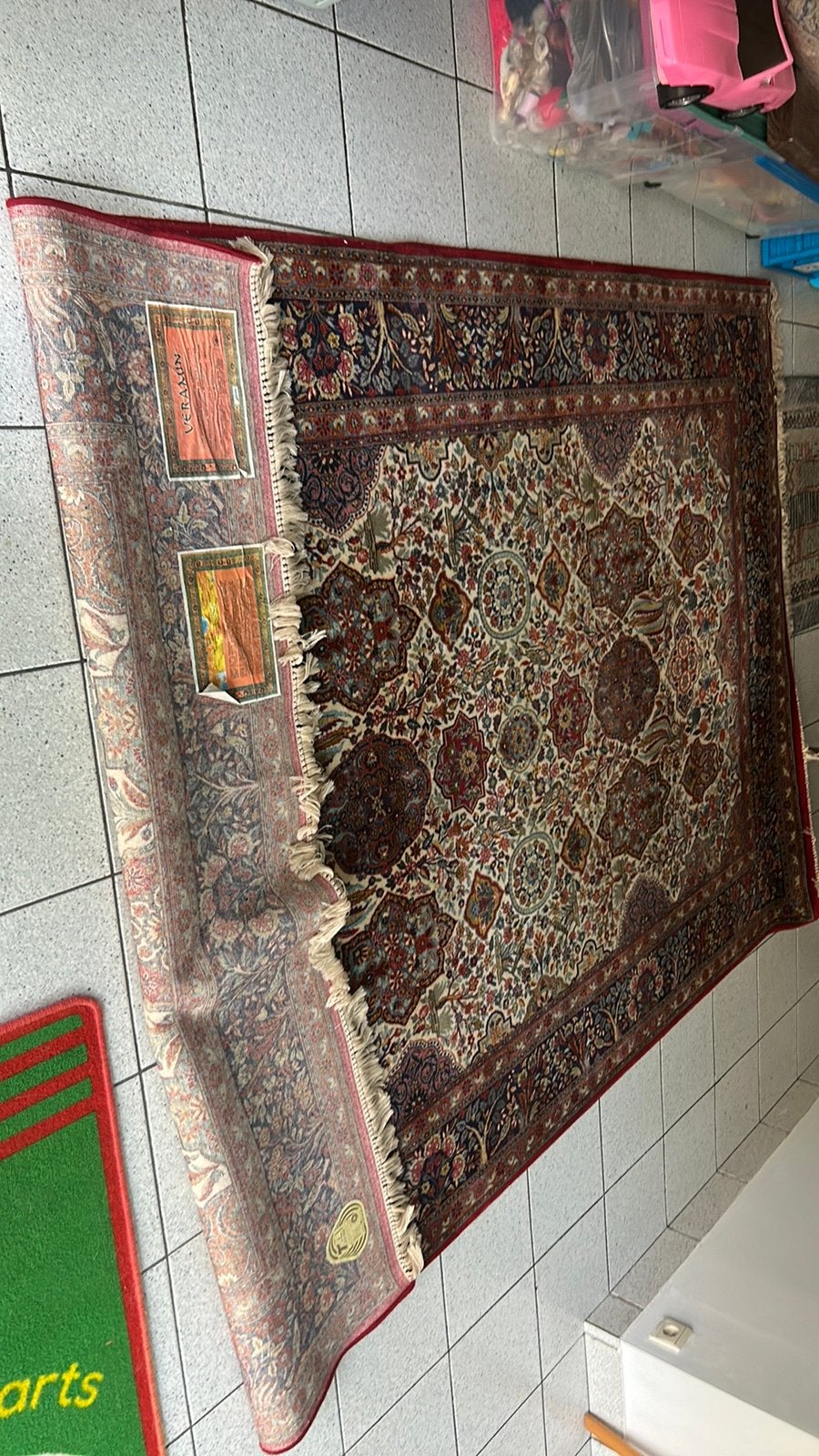Perzisch tapijt, Ophalen