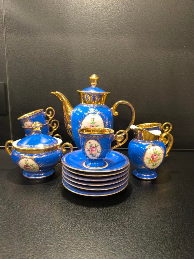 Cobalt-blauw porseleinen theeservies met goud., Antiek en Kunst, Ophalen