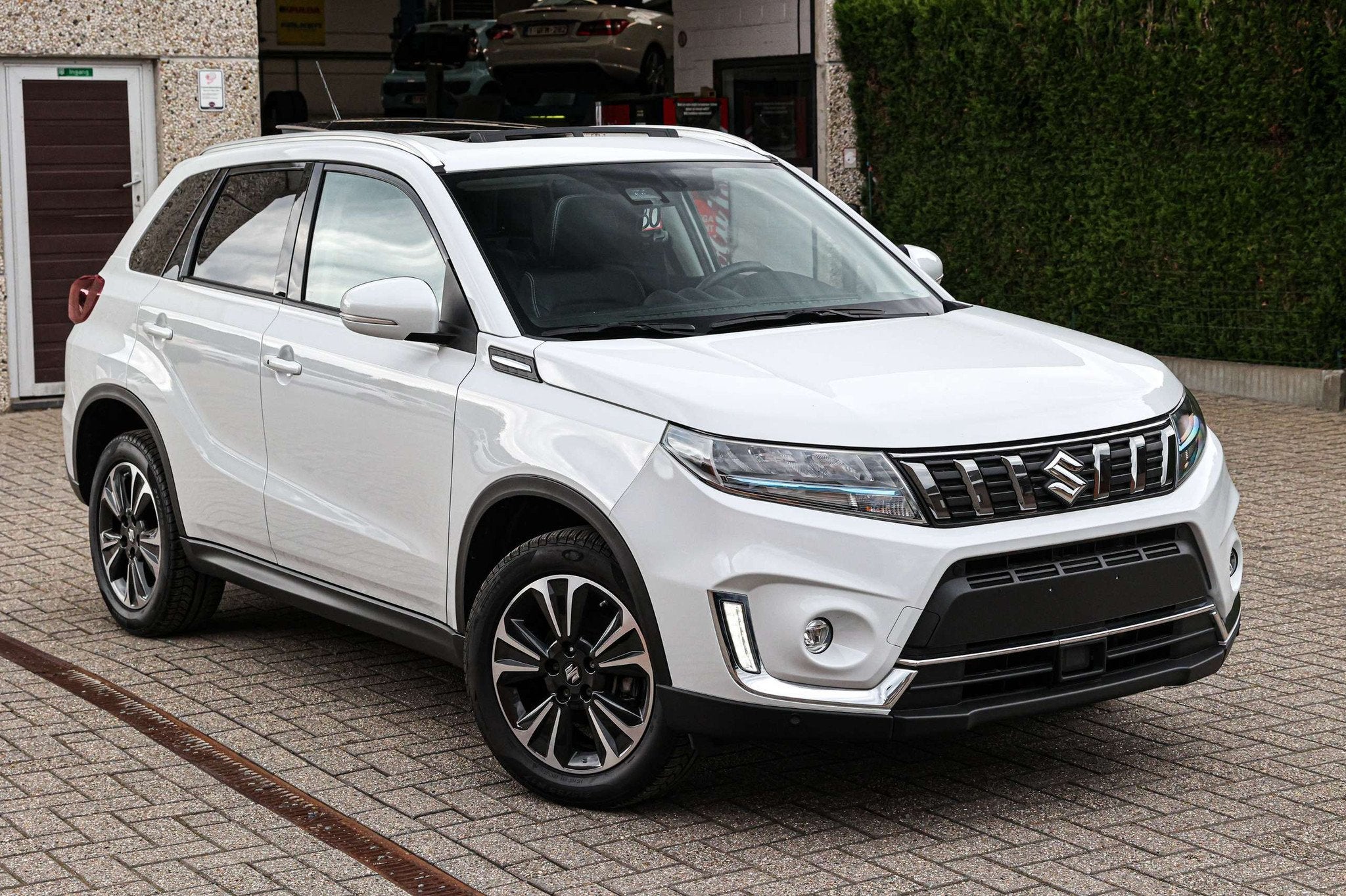 Suzuki Vitara PANO-DAK*AUTOMAAT*ACHTERRUITRIJCAMERA*NAVIGATI, Autos, 75 kW, Achat, Euro 6, Alcantara