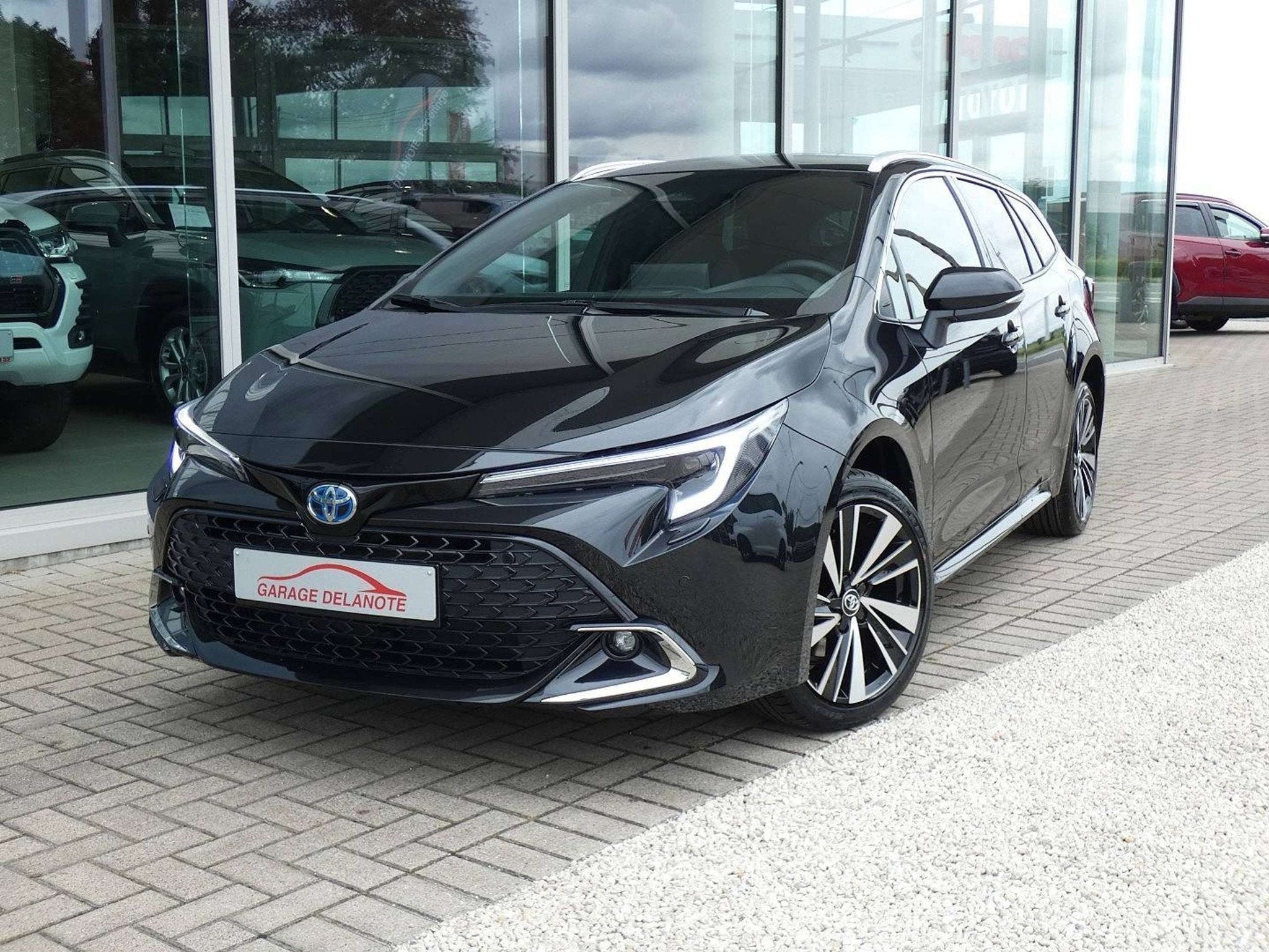 Toyota Corolla 1.8 Hybrid 140pk STYLE+WINTER PACK +Stuurwiel, Auto's, Toyota, Zwart, 4 cilinders, Corolla, Parkeersensor