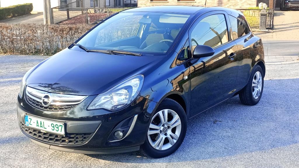 Opel corsa 1.2 benzine met vele opties., Auto's, Voorwielaandrijving, 129 g/km, 4 cilinders, Leder en Stof
