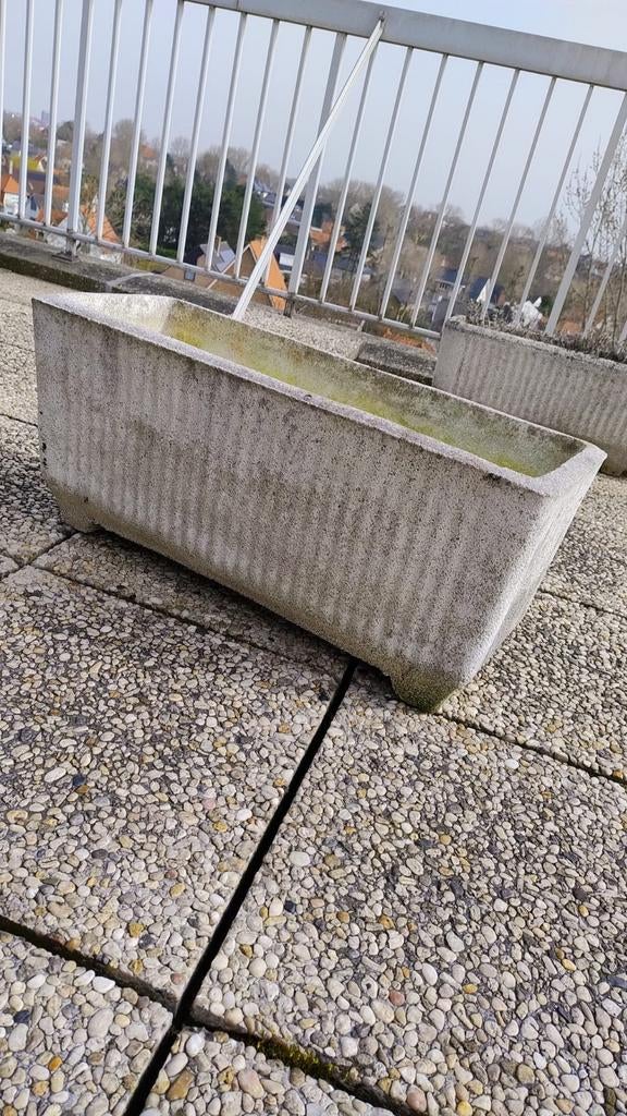 betonnen bloembakken, Ophalen