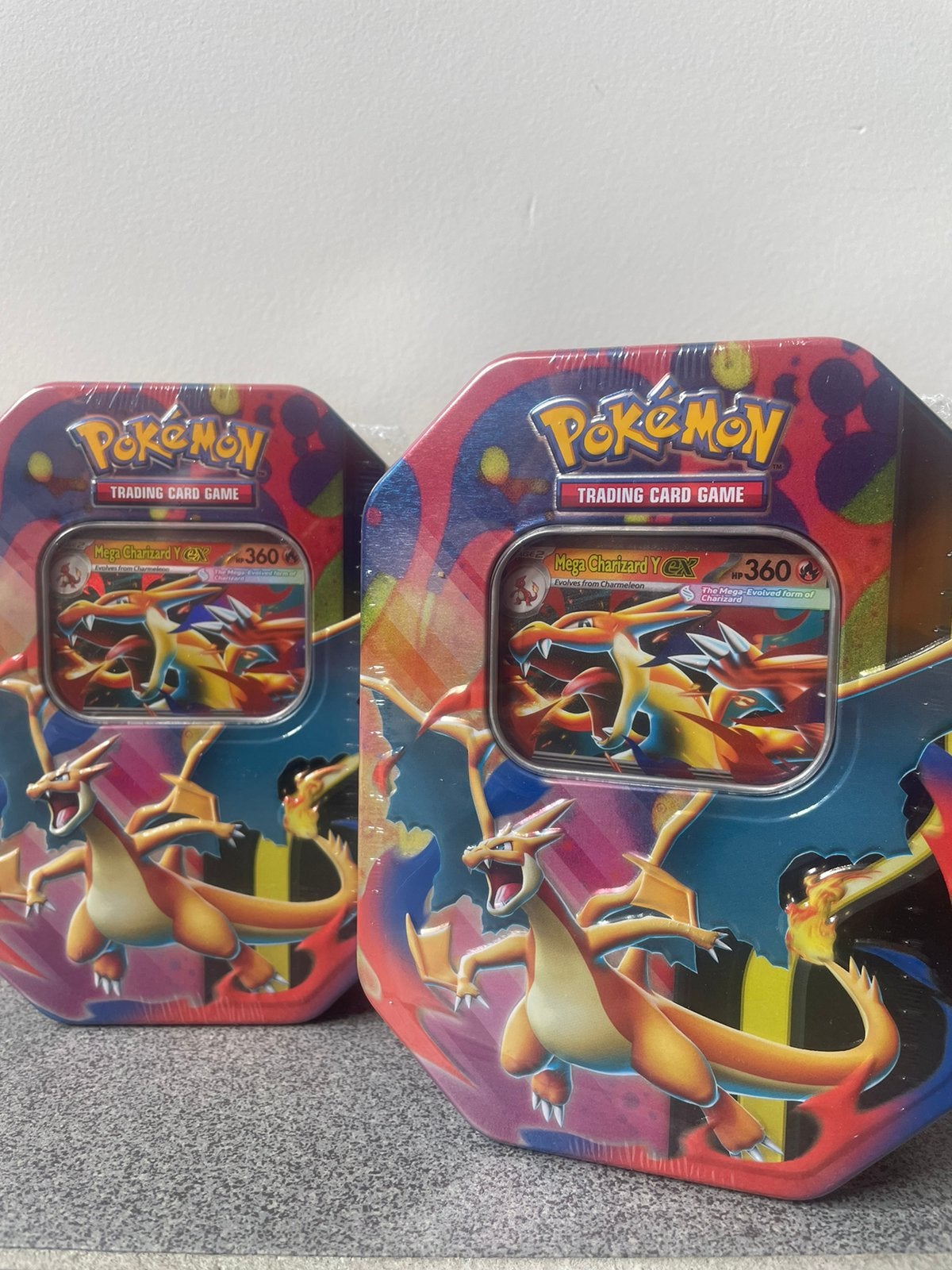 Pokemon mega charizard tin, Ophalen, Nieuw, Overige typen